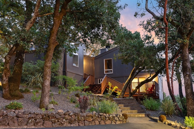 view of front of house featuring stairway