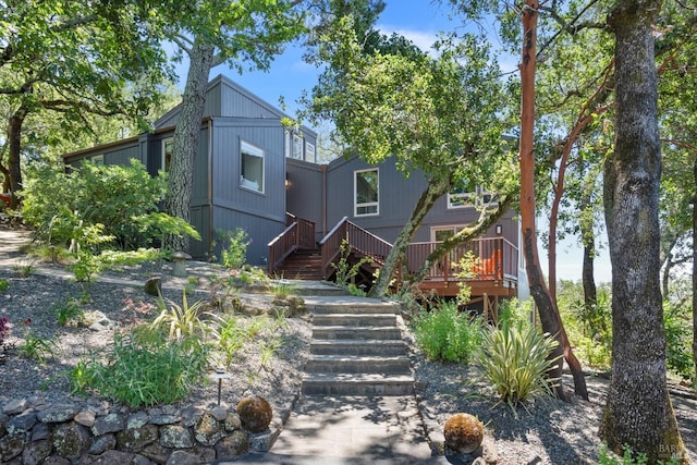 view of front of house with stairway