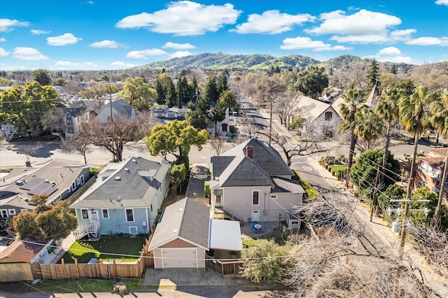 aerial view with a mountain view and a residential view