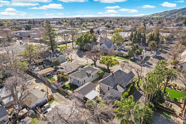 aerial view with a mountain view and a residential view
