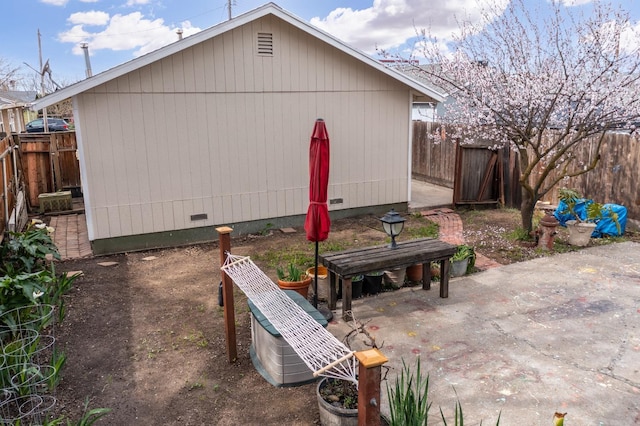 exterior space with a fenced backyard