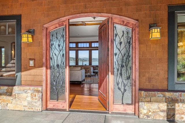 property entrance featuring covered porch