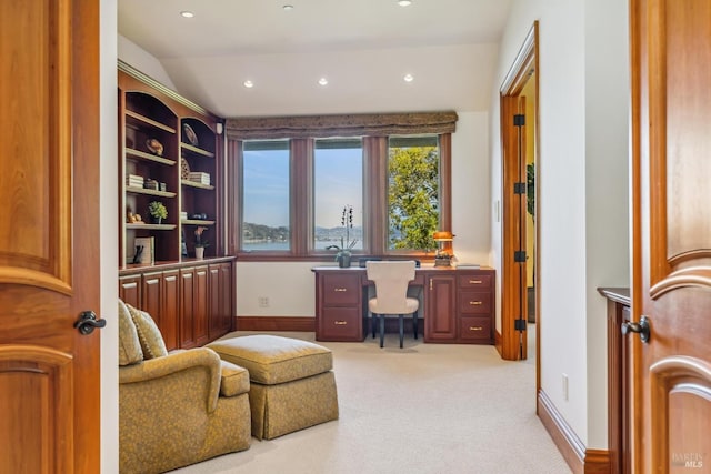 home office with recessed lighting, light carpet, and baseboards