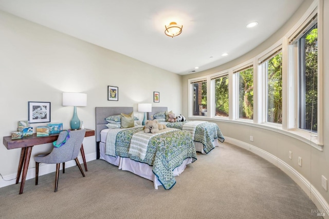 bedroom featuring recessed lighting, carpet flooring, and baseboards