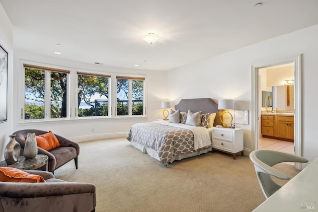 bedroom with recessed lighting, light colored carpet, visible vents, and baseboards