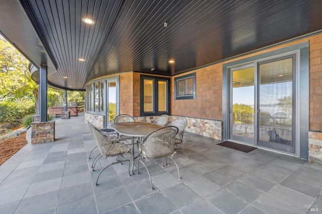 view of patio featuring outdoor dining space