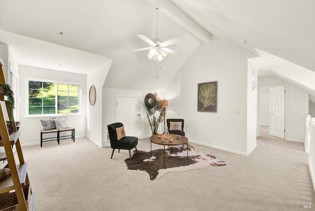 living area with lofted ceiling with beams, baseboards, a ceiling fan, and light colored carpet