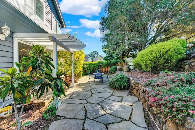 view of patio / terrace with outdoor dining area and a pergola