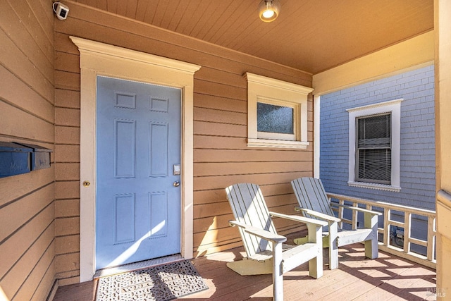 entrance to property with a porch