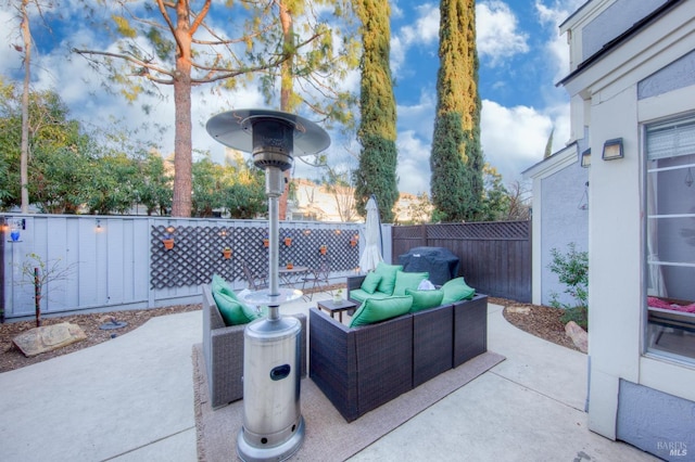 view of patio / terrace featuring an outdoor hangout area and a fenced backyard