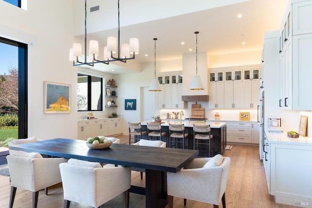 3878 Horizon View Way, Santa Rosa, CA 95404 - dining room with light wood finished floors, a chandelier, a high ceiling, and recessed lighting