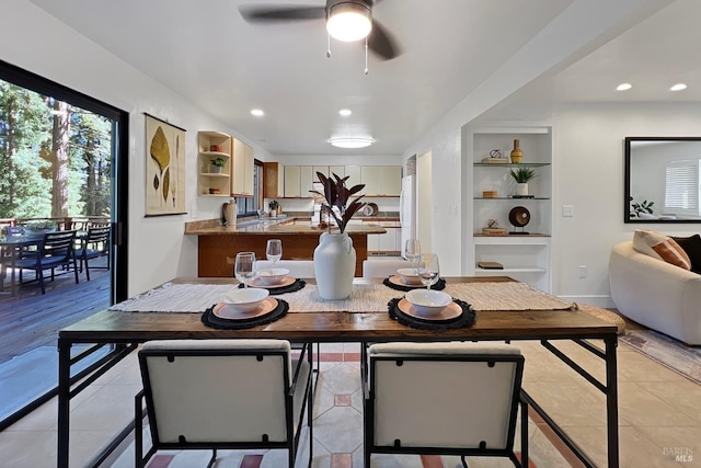 dining area with light tile patterned floors, recessed lighting, baseboards, and built in features