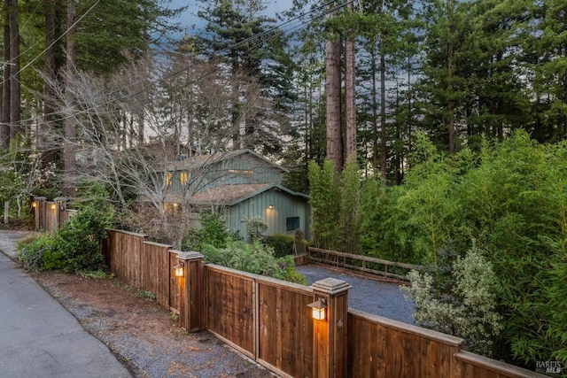 view of side of property with fence