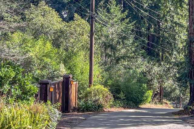 view of street featuring a view of trees