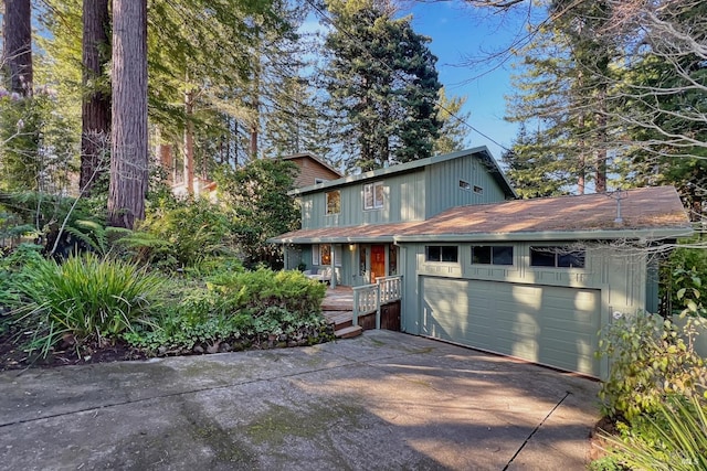 view of front facade featuring a garage and concrete driveway