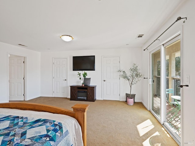 2108 Imola Ave Unit A, Napa, CA 94559 - bedroom with access to exterior, carpet flooring, and baseboards