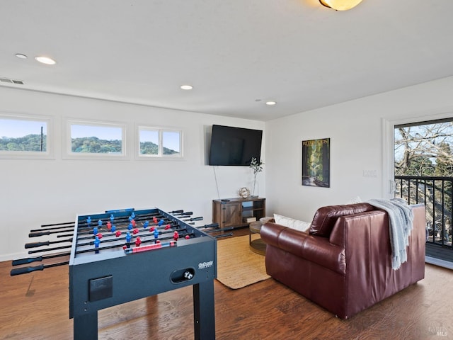 game room with visible vents, wood finished floors, and recessed lighting