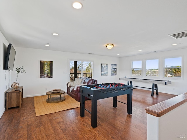 game room featuring baseboards, visible vents, wood finished floors, and recessed lighting