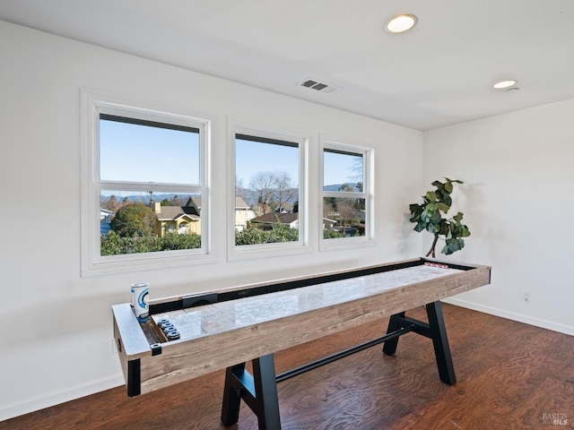 playroom featuring dark wood-type flooring, recessed lighting, visible vents, and baseboards