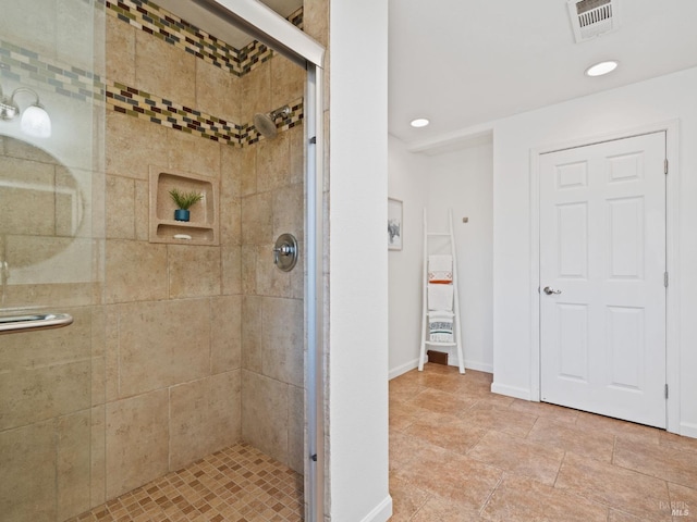 full bathroom featuring recessed lighting, visible vents, a shower stall, and baseboards