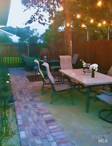 view of patio / terrace with fence and outdoor dining space