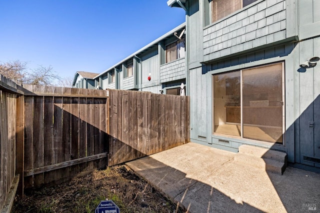 view of patio with fence