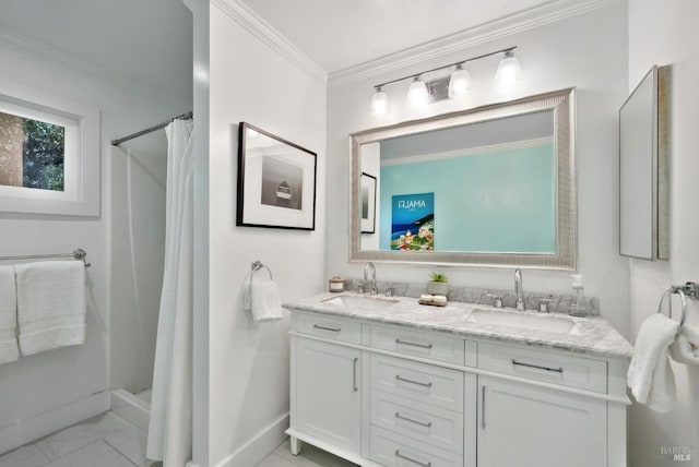 bathroom featuring double vanity, marble finish floor, ornamental molding, and a sink