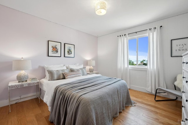 bedroom featuring light wood finished floors