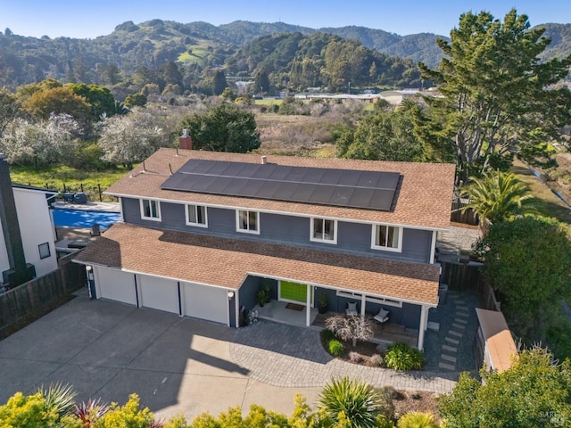 bird's eye view with a mountain view