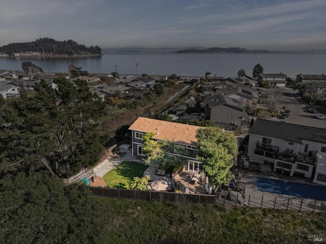 bird's eye view featuring a residential view and a water view