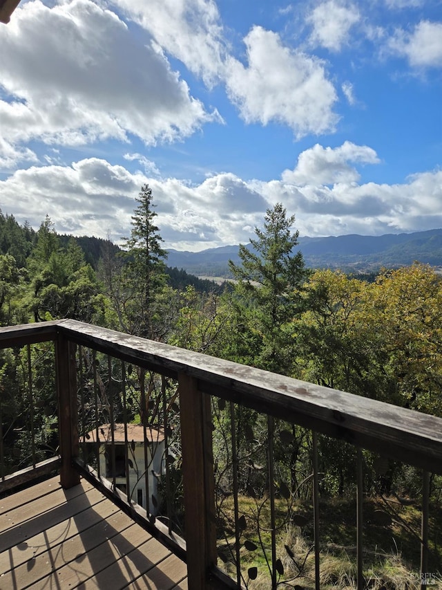 mountain view featuring a view of trees