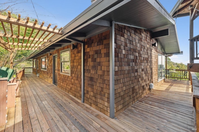 deck featuring a pergola