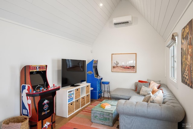 living area with light wood finished floors, vaulted ceiling, and a wall mounted air conditioner