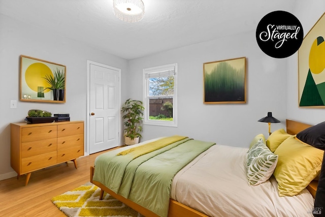 bedroom featuring light wood-type flooring