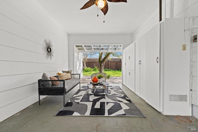 view of patio with visible vents, an outdoor hangout area, a ceiling fan, and fence