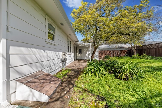 view of yard featuring fence