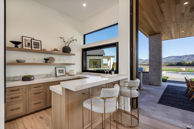 2350 Big Ranch Rd, Napa, CA 94558 - indoor bar featuring recessed lighting, a mountain view, light wood finished floors, and wooden ceiling