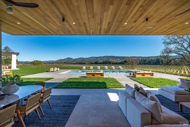 2350 Big Ranch Rd, Napa, CA 94558 - view of patio with a mountain view, outdoor lounge area, ceiling fan, an outdoor pool, and outdoor dining area