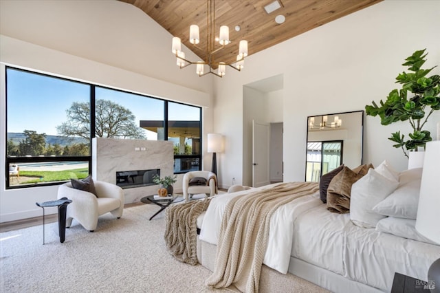 2350 Big Ranch Rd, Napa, CA 94558 - bedroom with a chandelier, multiple windows, wooden ceiling, high vaulted ceiling, and a fireplace