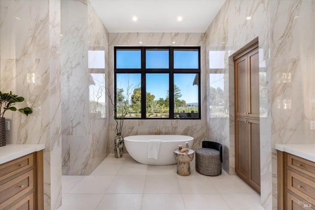 2350 Big Ranch Rd, Napa, CA 94558 - full bath featuring tile walls, a freestanding tub, tile patterned flooring, and vanity