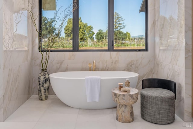 2350 Big Ranch Rd, Napa, CA 94558 - bathroom featuring tile walls and a freestanding bath