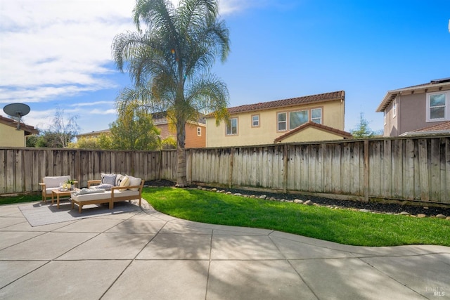 view of patio / terrace featuring a fenced backyard and an outdoor living space