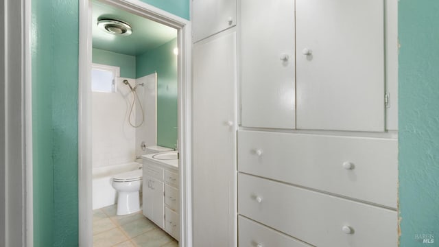 bathroom with shower / bathtub combination, vanity, toilet, and tile patterned floors