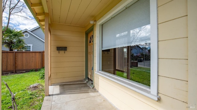 property entrance featuring fence