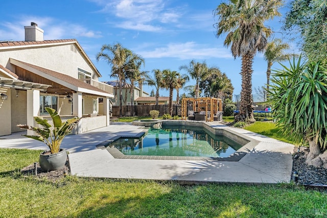 view of swimming pool featuring a patio, a fenced backyard, a pool with connected hot tub, and a pergola