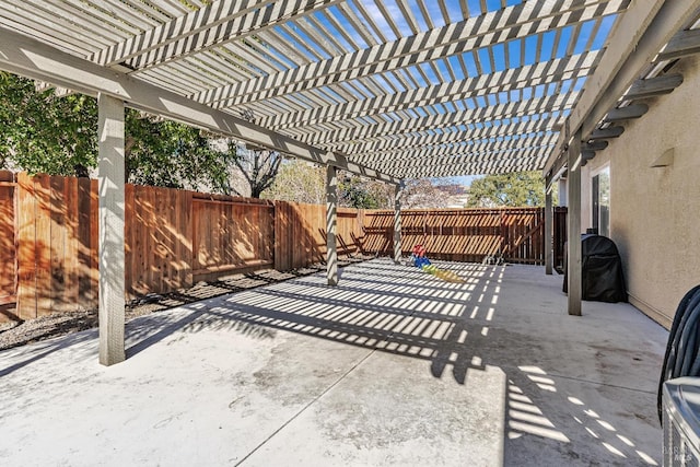 view of patio / terrace featuring a fenced backyard and a pergola