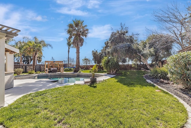 view of yard with a patio area, a fenced backyard, and a fenced in pool