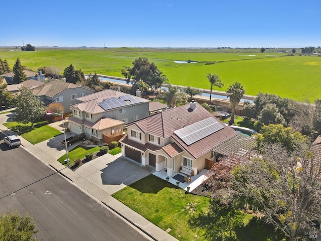 drone / aerial view with a residential view and a rural view