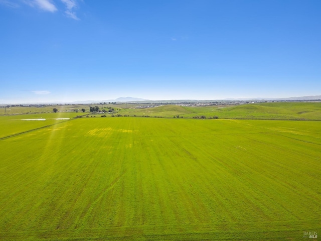 exterior space with a rural view