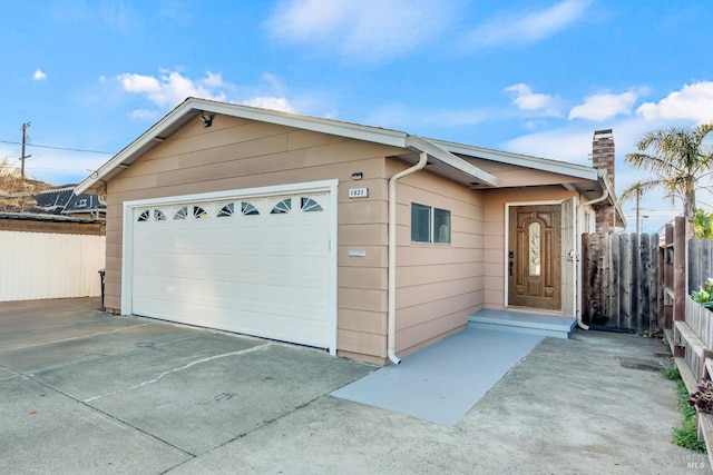 detached garage with fence